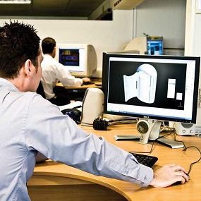 man on computer designing a product
