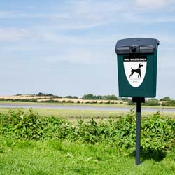 Fido Dog Waste Bin post mounted in a country lane