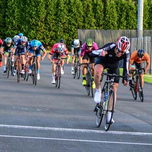 Cyclists race to the finish line in the Lewis Balyckyi Crits Series 2017