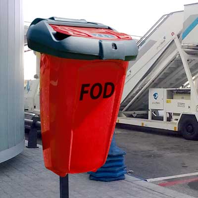 FOD 50 Bin in orange and post mounted at an airport